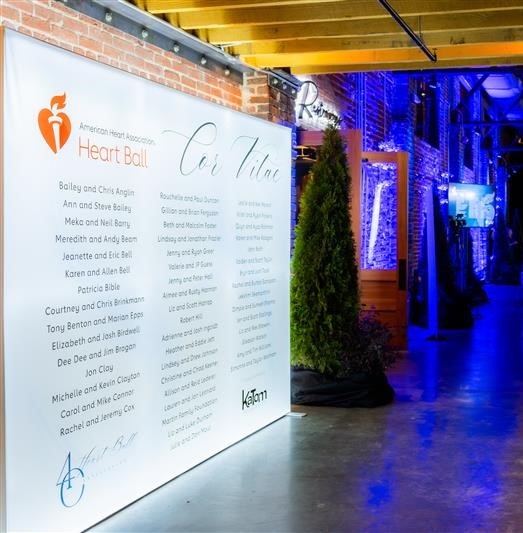 Banner with American Heart Association Heart Ball Cor Vitae Logo and a large list of names of members.